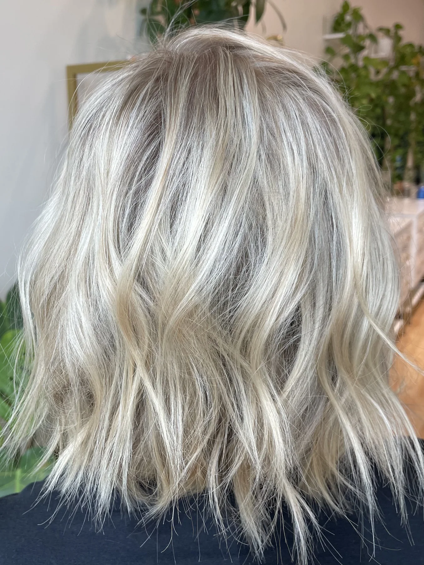 Soft blonde bob color by Kelly