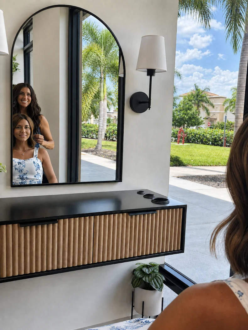 Kelly with a client in her private Estero studio