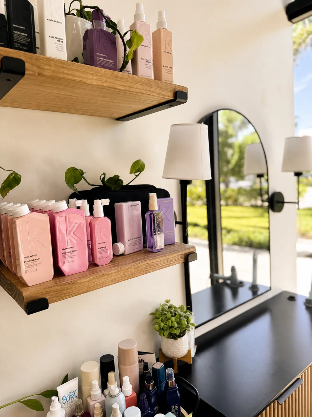 Professional products and mirror in Kelly's private Estero studio